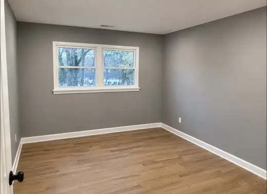 Baseboards & room repaint — after