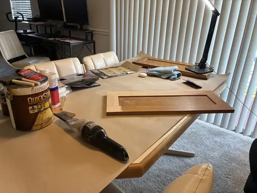 Cabinet stripping & restaining — during
