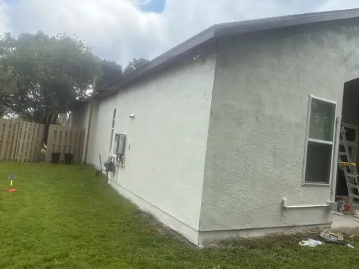Exterior & covered patio painting — during
