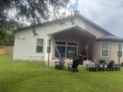 Exterior & covered patio painting — during