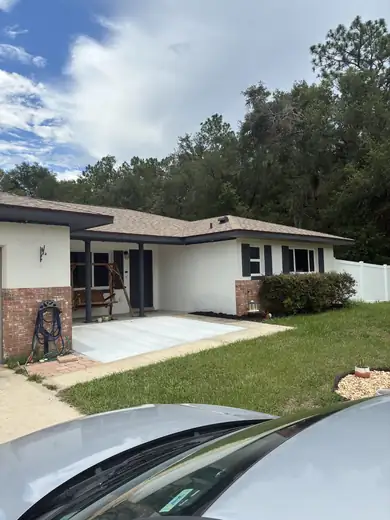 Gutter & exterior trim painting — during